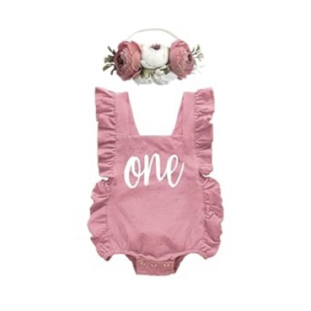 Mauve/dusty rose colored ruffle sleeveless romper.